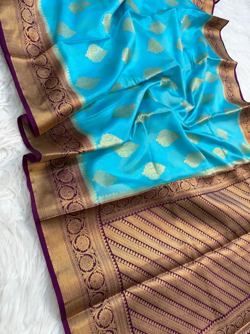 Firozi wine shade warm silk premium Banarasi saree