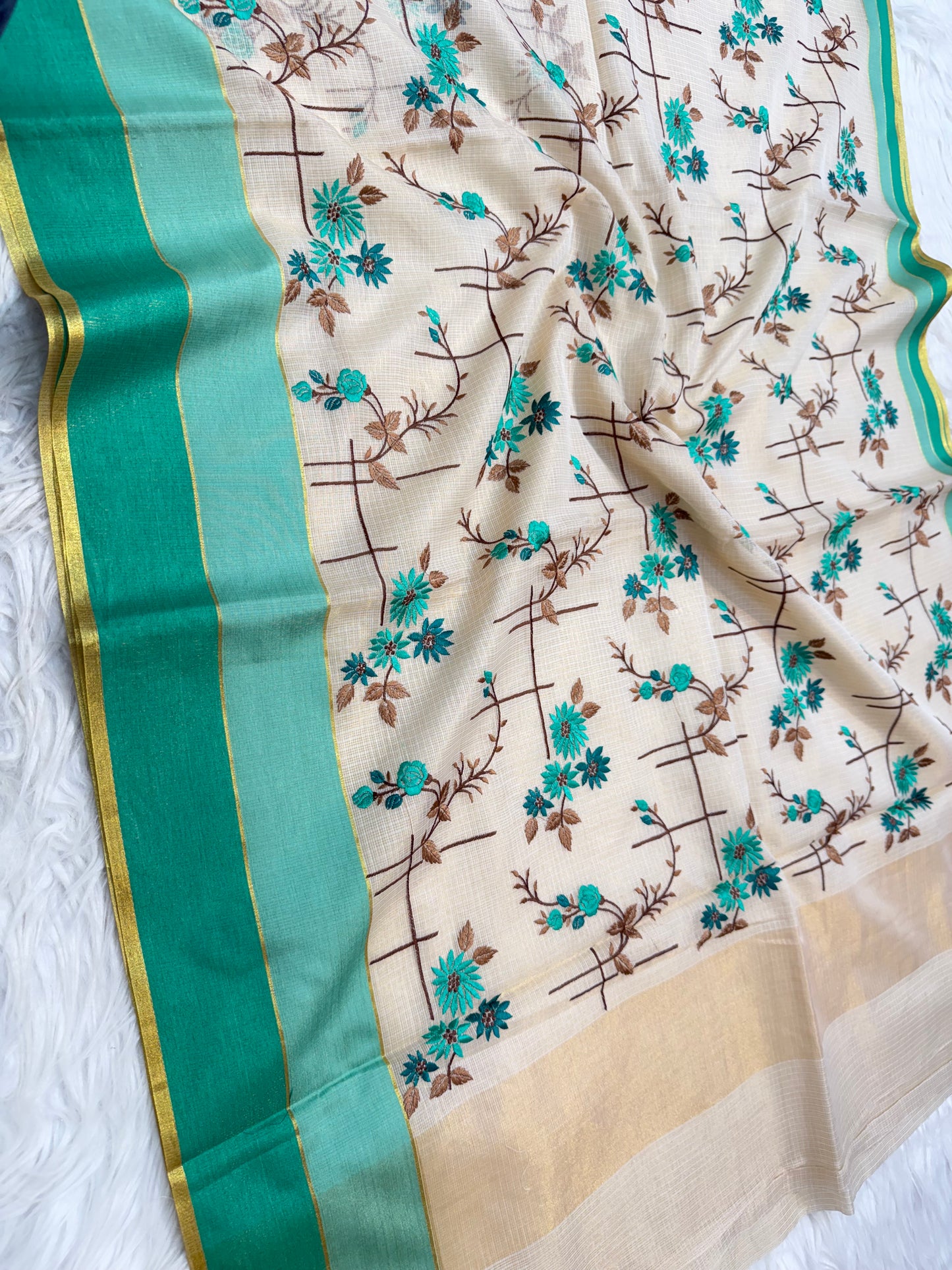 Off white sea green turquoise shade tissue kota embroidery Banarasi saree